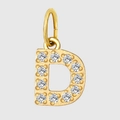 Macro shot of gold plated letter D pendant with sparkling zircon diamond setting - Letter D
