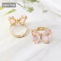 Elegant gold butterfly ring with light pink crystal wings and adjustable band - Light Pink
