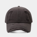 Close-up of distressed charcoal cotton baseball cap with ripped details and raw edges - Dark Gray