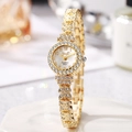 Elegante reloj dorado para mujer con correa de hoja y bisel con brillantes diamantes de imitación - Dorado