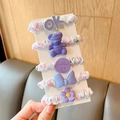 Detail of 5-piece floral fabric hair scrunchies featuring cute purple bear and flower charms - Purple Series 5-Piece Set