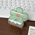 Sweet macaron green floral hair claw clip made of clear plastic on a dark wooden table - 5.3cm / Green