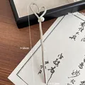 Épingle à cheveux en métal argenté avec design coeur torsadé et perle élégante - Cœur en Argent