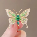 Elegant gold butterfly brooch with green wings and sparkling crystal rhinestones - 379# Butterfly
