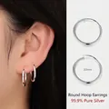 Minimalist S999 sterling silver hoop earrings 20mm diameter set shown on model - 20mm Silver