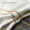 Thick gold rope chain necklace in durable titanium steel shown on elegant fabric backdrop - Thick Rope Chain (70cm) / Gold