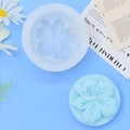 Round floral silicone mold for handmade soap and candles with hibiscus flower detail - White