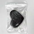 Biodegradable black heart-shaped konjac cleansing sponge in clear plastic packaging - Black Heart
