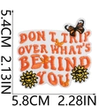 Macro shot of embroidered patch with quote Don't trip over what's behind you - No.17-Don't Trip Over Behind You (C18ZM-092-17)