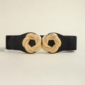 Macro shot of the interlocking golden knot buckle on a black elastic vintage corset belt - Black