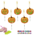 DIY Halloween pumpkin diamond painting keychain set with five vibrant orange pendants - Jack-O-Lantern Style