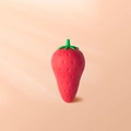 Cute giant strawberry shaped eraser for students in vibrant red with green leaves - Strawberry