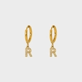 Detailed view of gold-plated stainless steel earrings with letter R and white zircons - Letter R