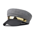 Detail of grey wool blend newsboy cap with black leather brim and metallic M logo - Gray (Gold Trim)