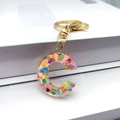 Letter C keychain featuring colorful heart sequins and glitter in clear resin - Letter C Lobster Clasp Keychain