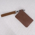 Brown washed canvas coin purse with a wristlet strap and dark metal hardware accessories - Coffee