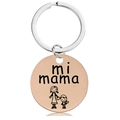 Macro view of rose gold round pendant with "mi mama" engraving and mother-child icon - Rose Gold Keychain (Y00036)