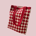 Close-up of red and beige checkered knit tote bag with durable canvas handles - Red Rhombus