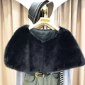 Faux fur shawl wrap in black, styled with hat and casual outfit for winter fashion - Black