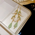 Detailed view of lily of the valley earrings with green resin drops and pearls - 49# Enamel Leaf Gold Lily of the Valley Tassel Hook