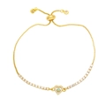 Macro view of adjustable gold heart bracelet with blue stone and cubic zirconia details - Light Blue
