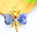 Golden butterfly ornament featuring heart-shaped blue natural crystal wings - Gold Plated Blue Sodalite
