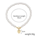 Baroque pearl necklace featuring a golden OT clasp and engraved heart-shaped pendant - Pearl OT Clasp Heart Locket Pendant Necklace (N2104-1)