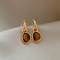 Elegant gold plated oval tiger eye earrings on soft silk fabric background - Silver Earring Post - Gold & Coffee (Real Gold Plated)