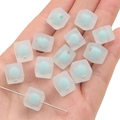 Frosted acrylic macaron square beads with light blue core held on a hand for DIY crafts - 10Pcs/Pack / Matte Green
