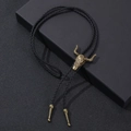Vintage western bolo tie with bronze bull skull pendant and black braided leather cord - One Size / Antique Bronze Ram Skull