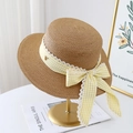 Handwoven boater straw hat with yellow gingham ribbon and lace trim on a gold stand - Brown