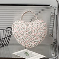 Heart-shaped quilted makeup bag with pink floral patterns and a soft top handle - Pink Floral