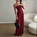Detail of red strapless maxi dress featuring a ruched bodice and flowing pleated skirt - S / Red