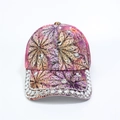 Detailed view of purple floral baseball cap with hand-set rhinestones and golden leaf print - Adjustable / Purple Diamond