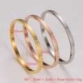 Set di tre bracciali in acciaio inossidabile con trama geometrica nei colori oro e argento - Acciaio+Oro+Oro Rosa