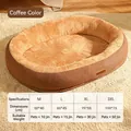 Oval coffee brown pet bed with warm beige plush lining and faux leather exterior trim - M / Coffee (Plush)