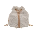 White frayed canvas bucket bag with golden chain and pearl charms in a modern style - Off White