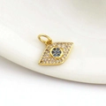 Macro shot of 18k gold plated evil eye charm with inlaid zircon and blue gemstone - 06-Pave Zircon Evil Eye