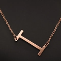 Elegant rose gold necklace featuring a minimalist horizontal letter I pendant design - Rose Gold I