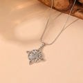 Detailed shot of Celtic knot pendant with opal and star symbols on a silver snake chain - Steel Style 8 (C417)