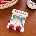 Red cherry hair tie with black and white plaid bow on warm wooden background - Hair Clip / 1# Black & White Gingham Bow Cherry Clip