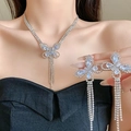 Close-up of silver butterfly jewelry set with rhinestones and long tassels on a model - 34# Butterfly Zircon Tassel - Silver (2-Piece Set)