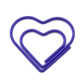Single purple heart-shaped paper clip made of smooth coated metal on white background - Blue