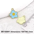Blue enamel tulip flower charm with a yellow smiley face for DIY jewelry making - Blue Smile Flower (BK1606#)