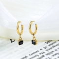 Golden hoop earrings with round black zircon stones in a sleek minimalist design - Black