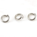 Macro shot of three silver 18K plated stainless steel jump rings for DIY jewelry making - Steel Color 0.5*3mm