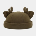 Detail of dark brown knitted deer beanie with 3D antlers and ears for autumn fashion - One Size / Army Green