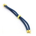 Detail of blue braided cord bracelet with adjustable gold metal slider and end caps - Light Blue