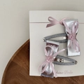 Detail of silver faux leather bow hair clips with pink ribbon on a display card - 5 Teardrop BB Clips Pair