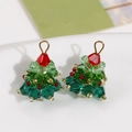 Macro shot of handmade beaded Christmas tree pendant with green crystals and gold hook - Gold Christmas Tree Accessory-Single
